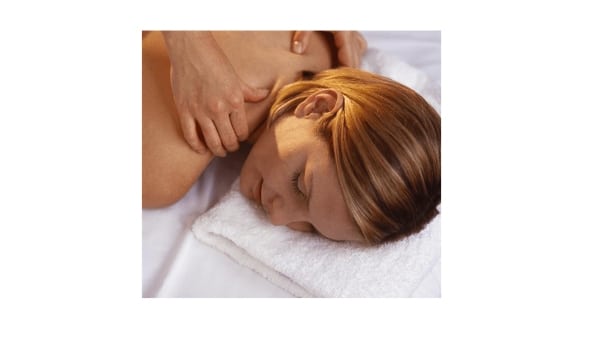 Woman getting a shoulder massage