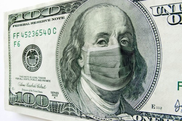 Hundred dollar bill with Benjamin Franklin wearing a surgical mask