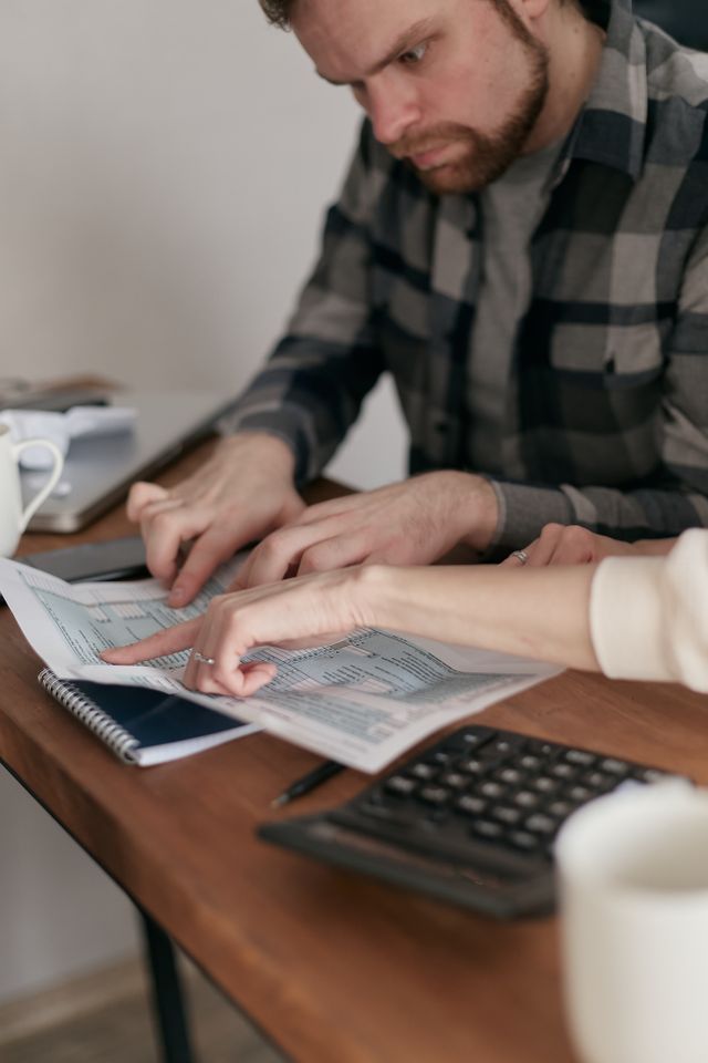 Couple comparing short-term health insurance plans in Texas at home