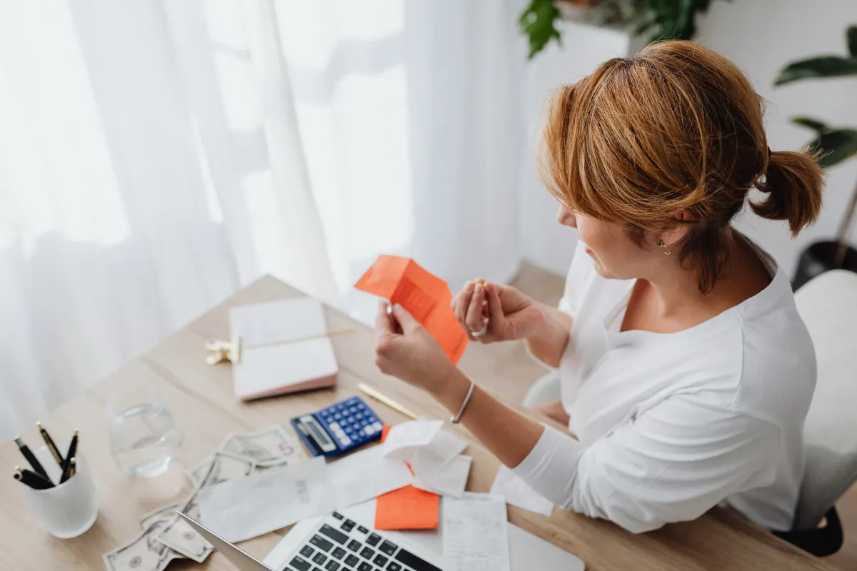 Texas saver sorting medical receipts to use the HSA withdrawal rules for a tax free reimbursement years later
