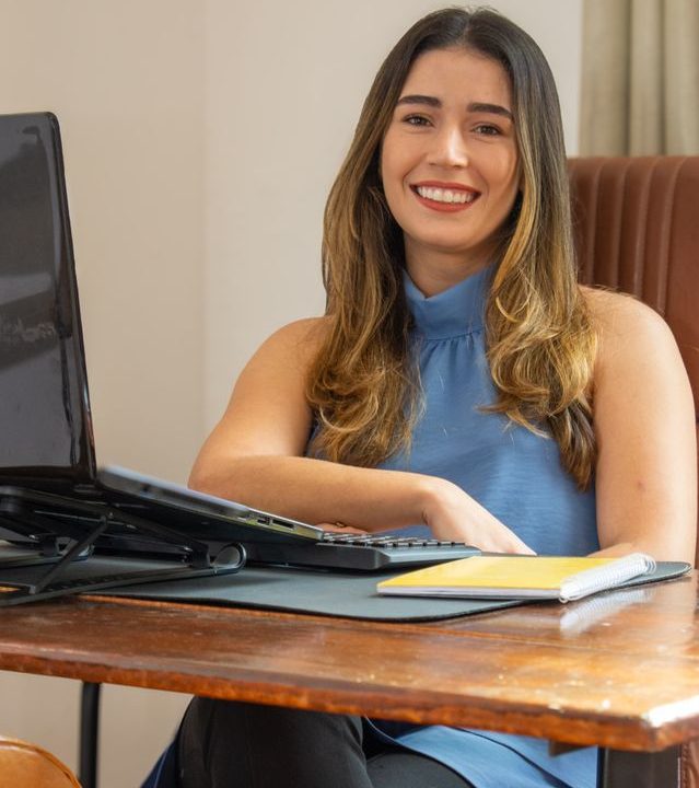 Insurance professional helping Texas businesses choose group health insurance plans