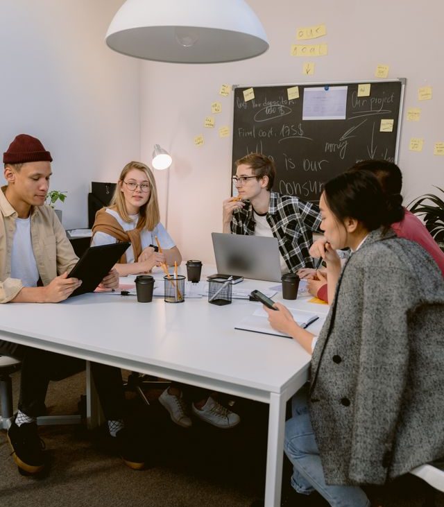 Small business team in Texas planning employee health insurance benefits strategy