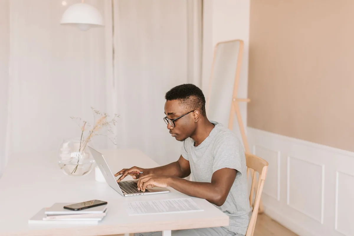 Reviewing an HSA-qualified Texas individual health insurance plan on a laptop