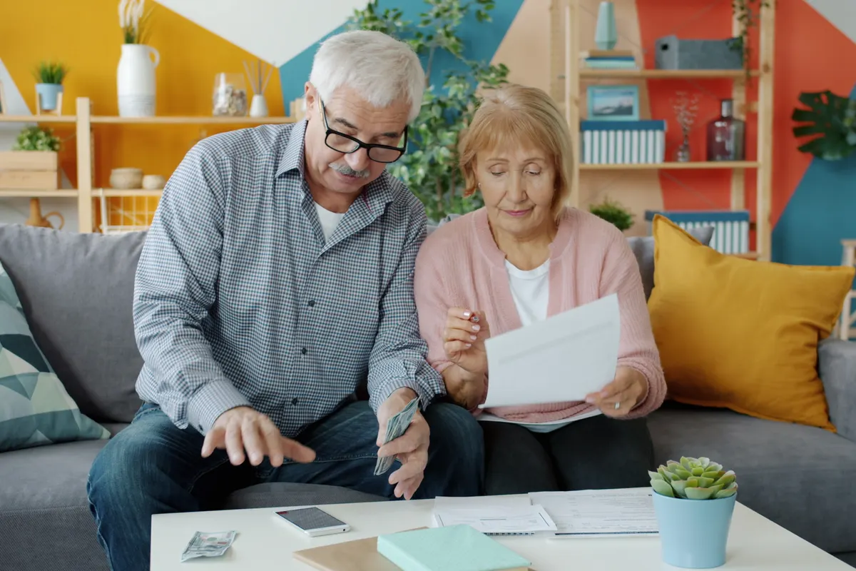 Older Texas couple reviewing health savings account Texas withdrawal rules after age 65