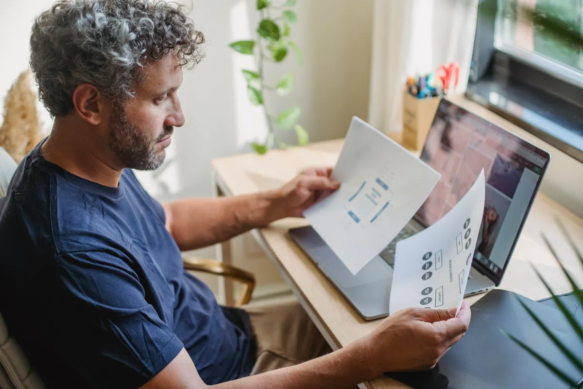 Texas freelancer comparing plan documents before opening a self employed HSA