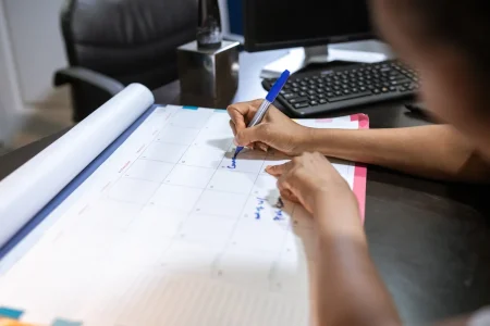 Marking a desk calendar with the dates for when is open enrollment for health insurance 2027 in Texas