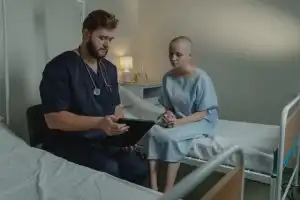 Temporary health insurance Texas – doctor reviewing coverage options with patient during medical consultation